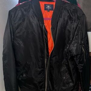 Asstseries MA-1 bomber flight jacket in black with an orange lining Size L